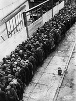 The homeless and unemployed of the Great Depression wait in line seeking shelter in New York